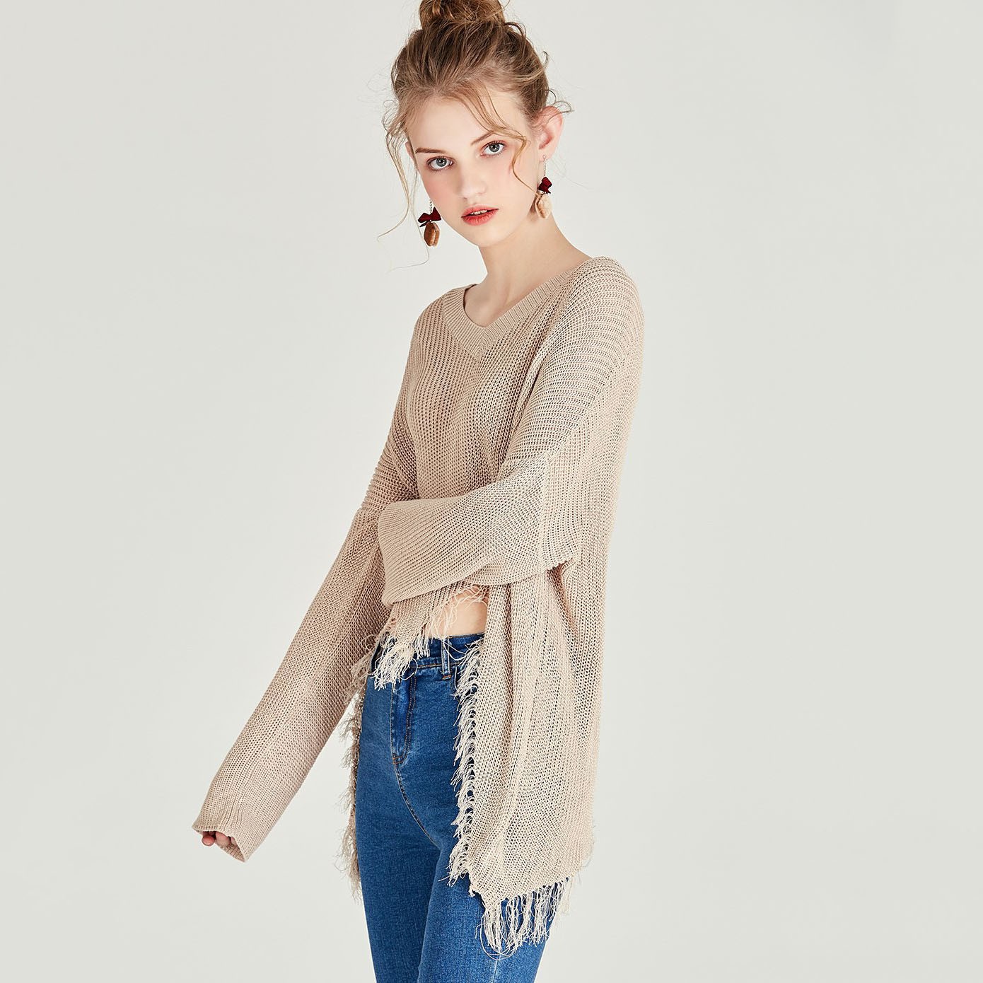 Knit women's casual V-neck hollow simple tassel hem pullover